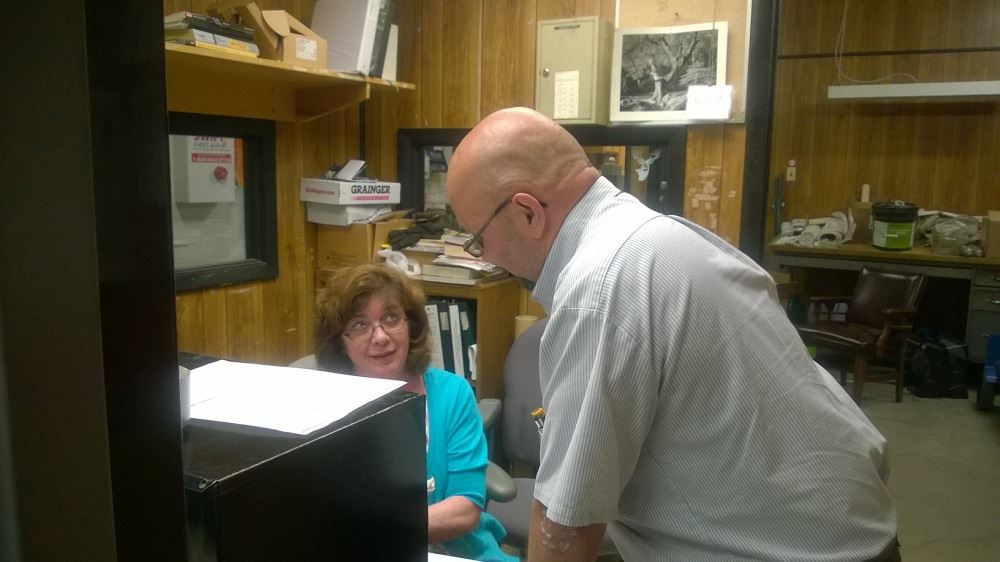 Two staff members talking