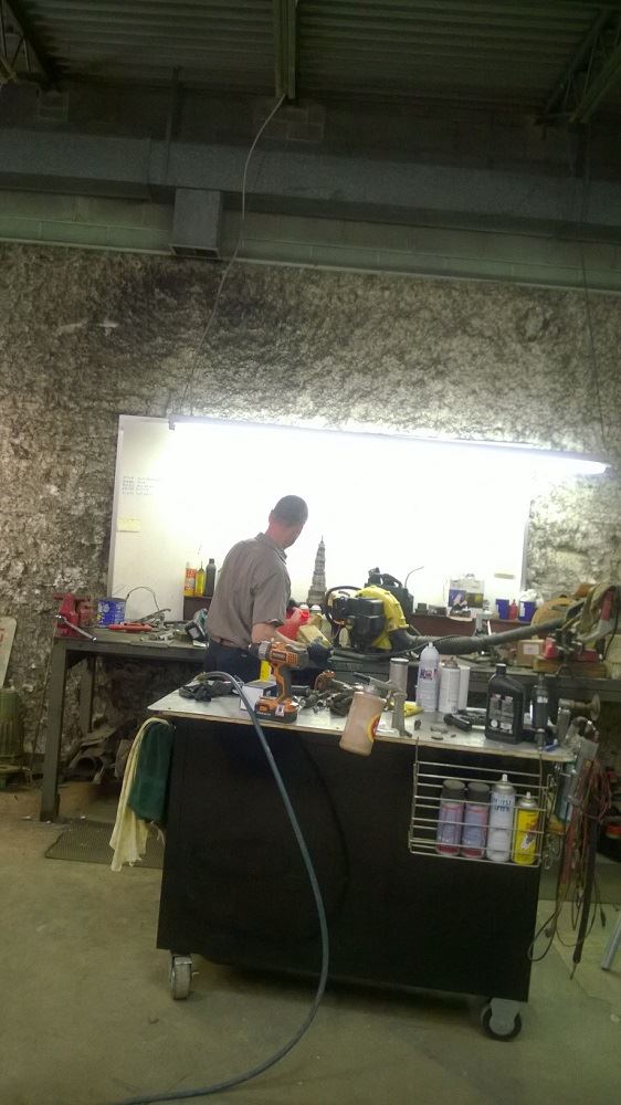 A staff member working in a shop